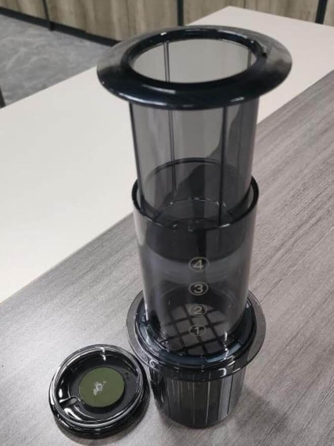 Filter coffee maker manual espresso machine showcasing a compact brewing system for flavorful coffee.